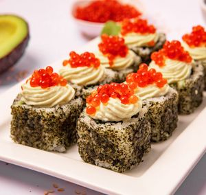 Vegan Non Caviar Sushi.
Incredibly balanced taste of creamy avocado, crispy fresh cucumber rolled with cream-cheese and rice. Sushi rice, cucumber, avocado, wakame at Dobro Top Vegan   in Dubai