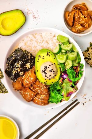 Vegan Unagi Bowl.
Cream cheese, avocado, fresh cucumbers and crispy nori vegan unagi. Quinoa or rice( white or black), trio salad, cucumber, avocado, sesame seeds, cream cheese at Dobro Top Vegan   in Dubai