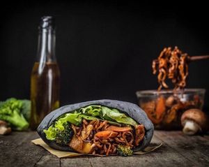 Pita Hong Kong.
Black pita stuffed with Asian mix of tastes - noodles, vegan non-chicken, veggies all mixed with Asian yaki sauce. Anti toxic black pita with coal , vegan noodles. at Dobro Top Vegan   in Dubai