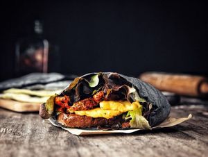 Pita New York.
Black pita with favorite tastes of new york - barbecue sauce, cheese and seitan. Anti toxic black pita with coal, seitan, vegan cheese sauce, barbecue sauce, ... at Dobro Top Vegan   in Dubai
