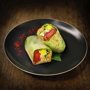 Burrito Philadelphia.
Favorite philadelphia sushi rolls, but much better and  wrapped in a tortilla. Antioxidant green tortilla with spinach, vegan non-salmon, sushi rice, ... at Dobro Top Vegan   in Dubai