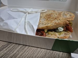 The best sandwich I had so far in the UAE. I truly recommend this place.
The cakes are so good also. I loved the German cake, it reminds me the Argentinian dulce de leche. at Dobro Top Vegan   in Dubai