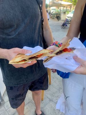 Jack & Maddie showing off their pizzolo at Vegan Food Tour Ortigia in Siracusa