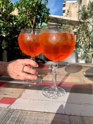 Ann bought me an Aperol spritz!   at Vegan Food Tour Ortigia in Siracusa