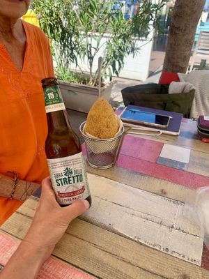 Vegan Sicilian beer and epic street food, arancino! April 2024 at Vegan Food Tour Ortigia in Siracusa