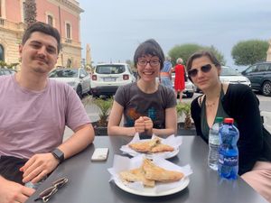 Enjoying Sicily's creation - the pizzolo! April 2024 at Vegan Food Tour Ortigia in Siracusa