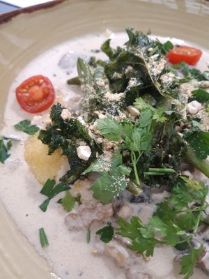 Polenta with creamy mushroom sauce and kale chips at Ravintola Lohtu in Helsinki