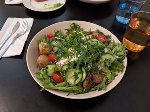 Salad with tofu skagen, dill cucumbers and potatoes 🩵 at Ravintola Lohtu in Helsinki