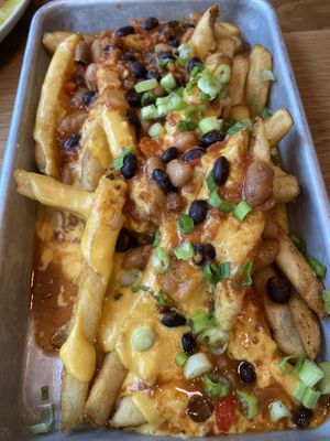 Loaded fries (with cheese and chilli) at Veggie Grill by Next Level - University Village in Seattle