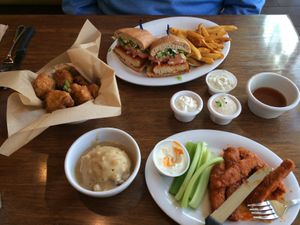 B wings, cauli mash, crispy cauliflower, buffalo bomber (replaced by the crispy buffalo chick'n sandwich) at Veggie Grill by Next Level - University Village in Seattle