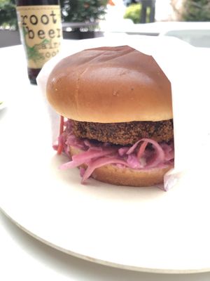 Crab cake sandwich with slaw  at Veggie Grill by Next Level - University Village in Seattle