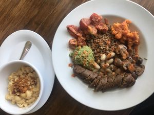 Mac and cheese and the rustic farm bowl with apple sage sausage! So yummy! at Veggie Grill by Next Level - University Village in Seattle