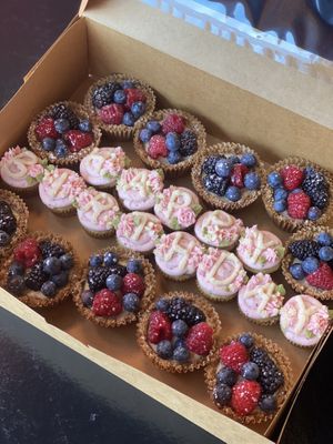 Custom v+gf Lemon tarta with berries and mini cupcakes with raspberry and matcha buttercream  at Heart Baker - Cloud Kitchen in Buena Vista
