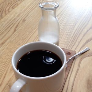 coffee and almond milk at Little Bird Organics - Kingsland in Auckland