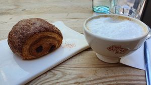 Vegan pain au chocolat and soy latte at Le Pain Quotidien - St. Honore in Paris