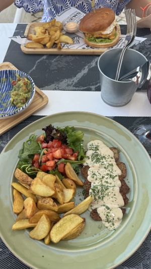 Vegan Seitan with delicious sauce and wedges🤩🤩  at Vegood in Vila Real De Santo Antonio