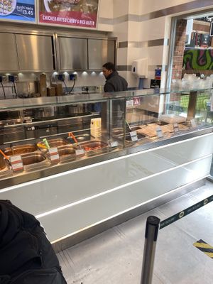 Hot food serving area  at Wasabi - Victoria Station in London