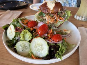 Zen burger with side salad   at Buddha Belly Burger in Sacramento