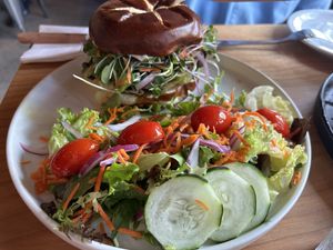 Lion’s mane burger with side salad   at Buddha Belly Burger in Sacramento