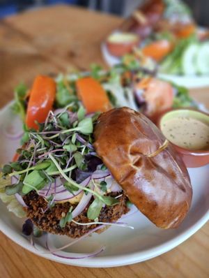 Country Fried Steak Burger with an awesome side salad at Buddha Belly Burger in Sacramento