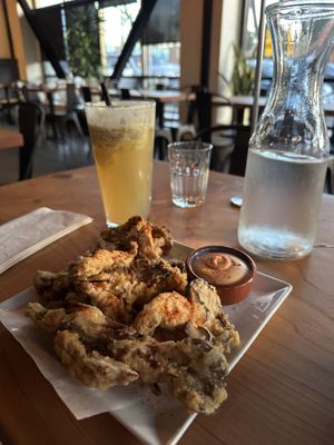 Maha mushrooms with Fuji apple lemonade in the back    at Buddha Belly Burger in Sacramento