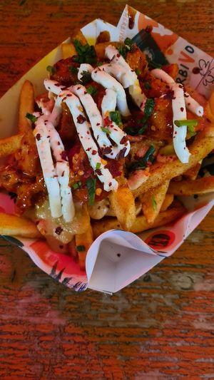 Buffalo wings on cheesy fries at Herbivorous Spark   in York