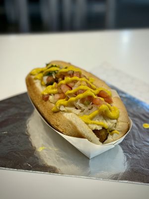Vegan Dog with tomatoes, onions, sauerkraut and mustard  at Haute Doggery in Las Vegas