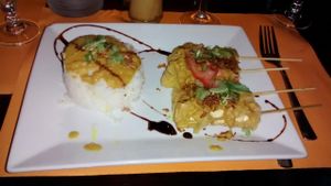 Tofu skewers with rice, spices and a peanut sauce at O Bali in Toulouse