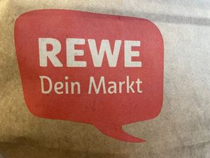 Rewe logo  at BER - REWE - T1 in Berlin