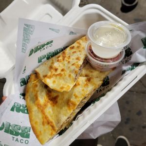 Vegan quesadilla with sour cream and Pico at Paradise Taco in Brooklyn