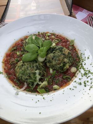 Spinach Dumplings with tomato ragout (no cheese)  at Neumannmühle Berghütte & Wirtshaus in Sebnitz