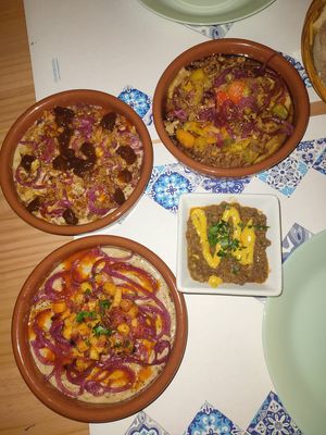 Tris di hummus e assaggio di lenticchie in latte di cocco e spezie. at Casbah del Moro in Catania