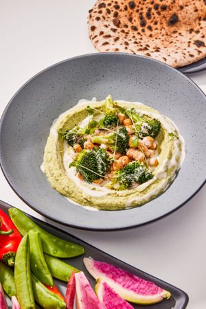 ROASTED GARLIC + BROCCOLI HUMMUS Lemon Garlic Tahini. House-made Sourdough Pita or Seasonal Crudite. at Love.Life in Culver City