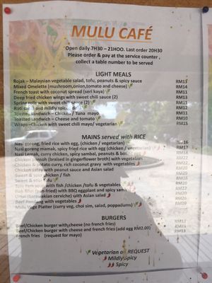 Cafe menu with labelled vegetarian options   at Gunung Mulu National Park Cafe in Mulu