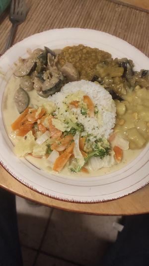 Combination of different elaborations served with rice at K 41 in Augsburg