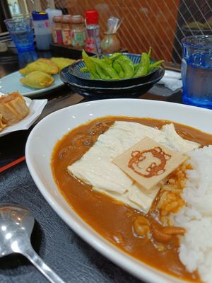 Right: Yuba curry. Above edamame, above left vegan gyoza. On the left side were some of balls, not vegan, ordered by the +1. at Azuma in Nikko