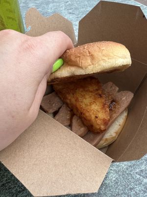 Vegan sausage and hash brown brioche   at The Babbacombe Beach Cafe  in Torquay