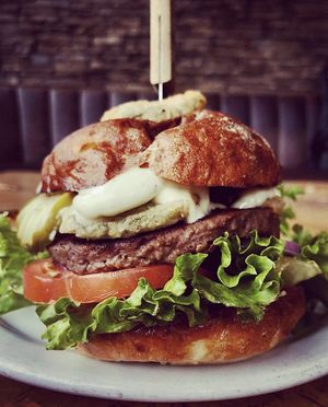 Burger-photo taken from their Instagram  at Shelter Lounge in Seattle