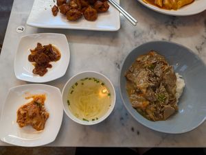 Bulgogi with accompaniments - soup, lotus root, kim chi at Vegan Insa - 비건인사 in Seoul