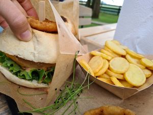 Vegan burger with onion ring and wild garlic pesto at 69 Food in Kranj