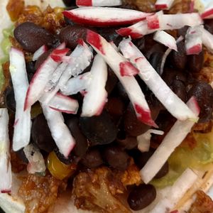 Veggie taco (brussel sprouts, beans, guacamole)  at Tacos Tequila Whiskey - 32nd Ave in Denver