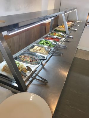 Vegan food in buffet at Blissful Healthy Vegan Takeaways in Hamilton
