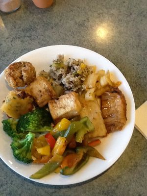 A sampling, there's signs labeling the names of the dishes, though not what's in them. They set aside gluten free to one side of the bar but I would ask for more info if you have any allergies. at Blissful Healthy Vegan Takeaways in Hamilton