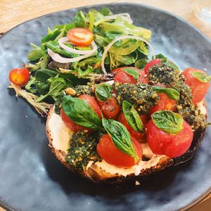 Vine tomatoes on toast with pesto  at Back to Eden in Central Singapore