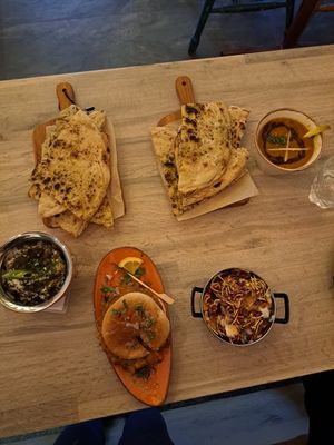 Mushroom saag, tarka dhal, garlic nan and Appetisers at Vegan Dhaba in Birmingham