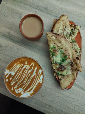 Butter chicken curry and chilli cheese naan at Vegan Dhaba in Birmingham