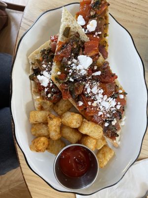 Tomato confit with tater tots  at Cafe Birdie in Edwardsville