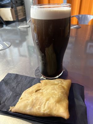 A stout and a samosa   at Microbus Gateshead in Gateshead