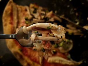 Detail of enoki mushroom. Yum! at A Tal da Pizza in Sao Joao Da Madeira