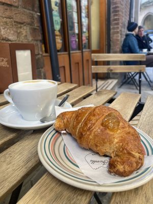 Croissant with marmalade. Soya cappuccino   at Torrefazione Fiorella in Siena